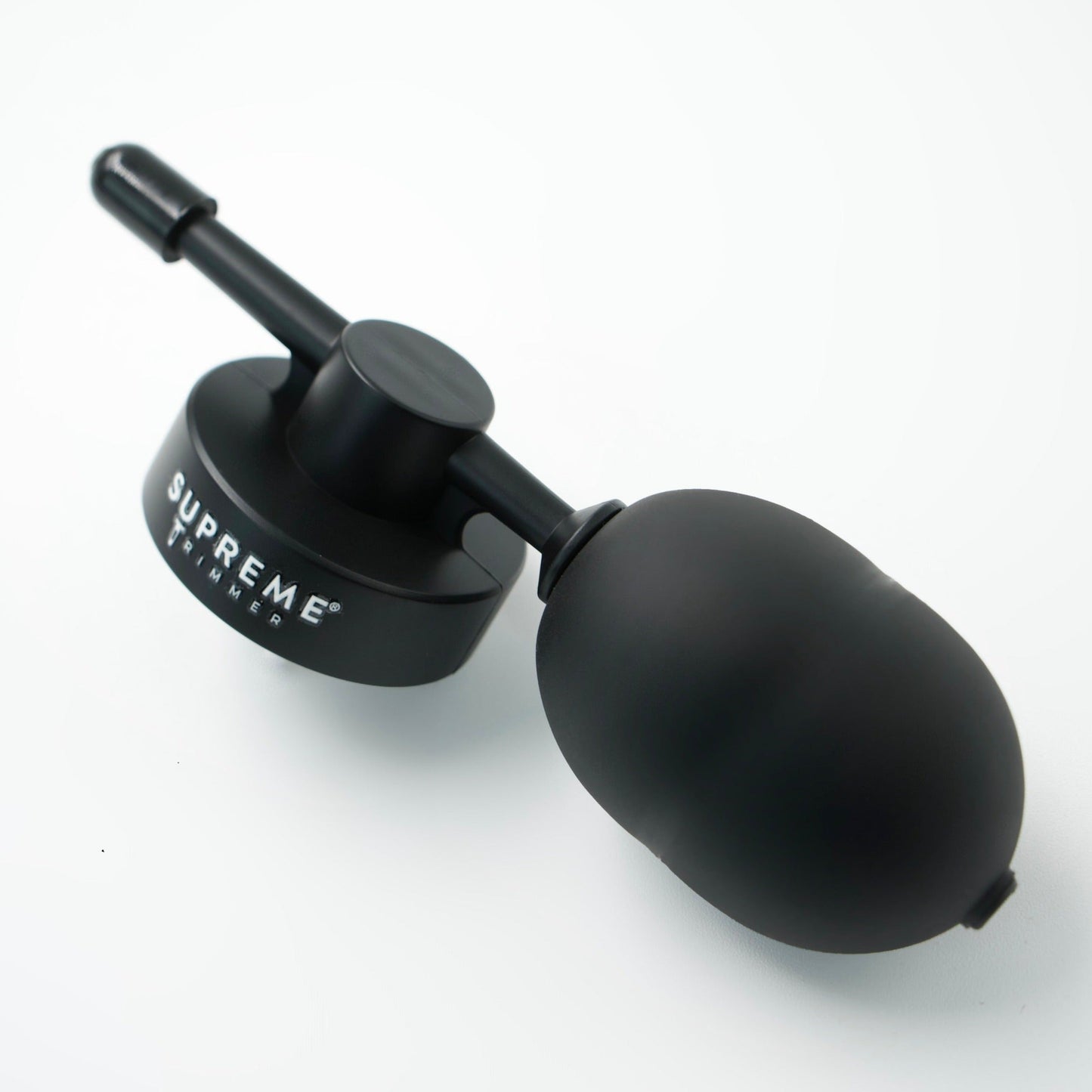 Supreme Trimmer HairThik HFAT1 fiber applicator pump – barber using applicator on a client