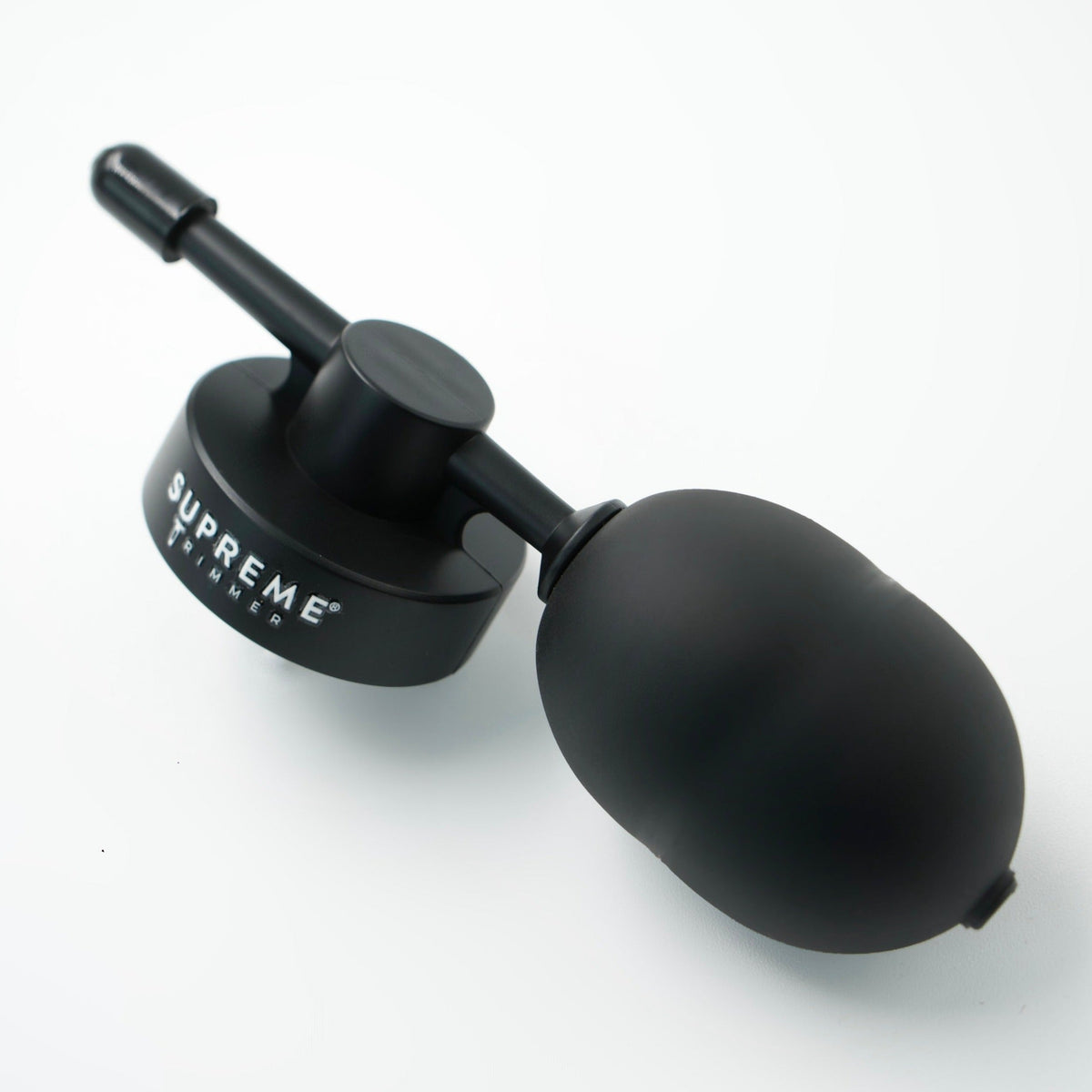 Supreme Trimmer HairThik HFAT1 fiber applicator pump – barber using applicator on a client