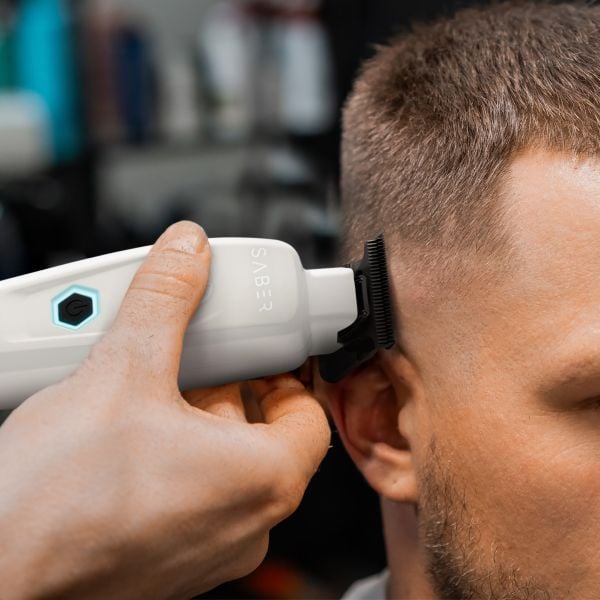 StyleCraft Pro Saber metal trimmer white brushless barber tool