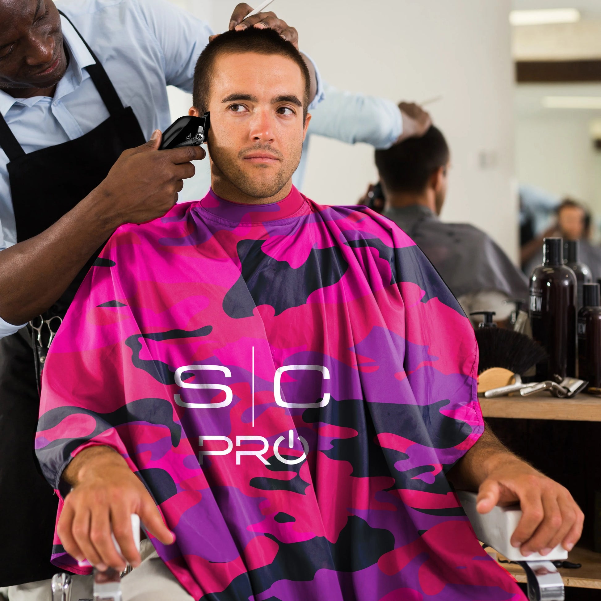 StyleCraft Radioactive barber stylist cape pink camo