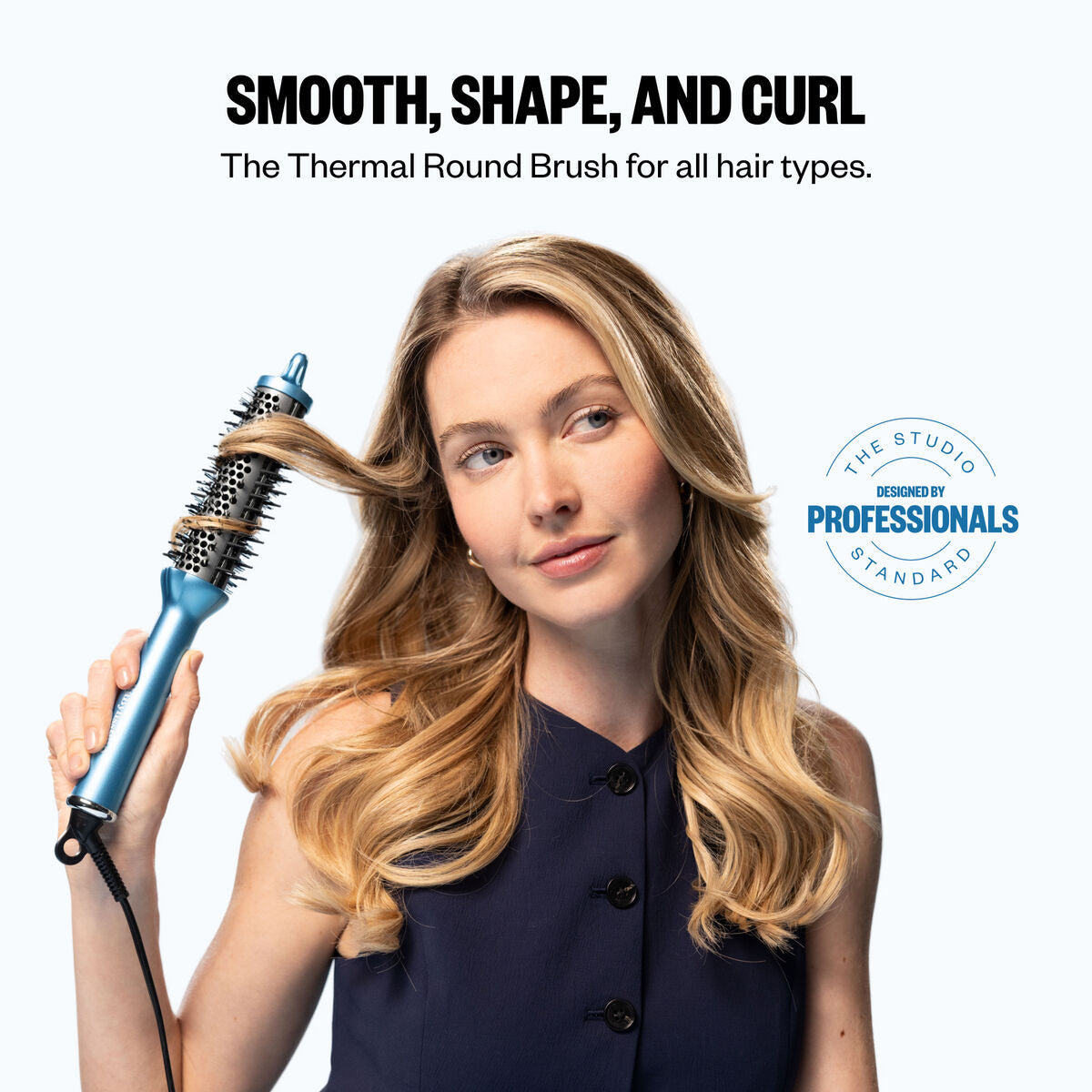 BaBylissPRO BNTHTB125 thermal round brush shown smoothing and shaping dry hair
