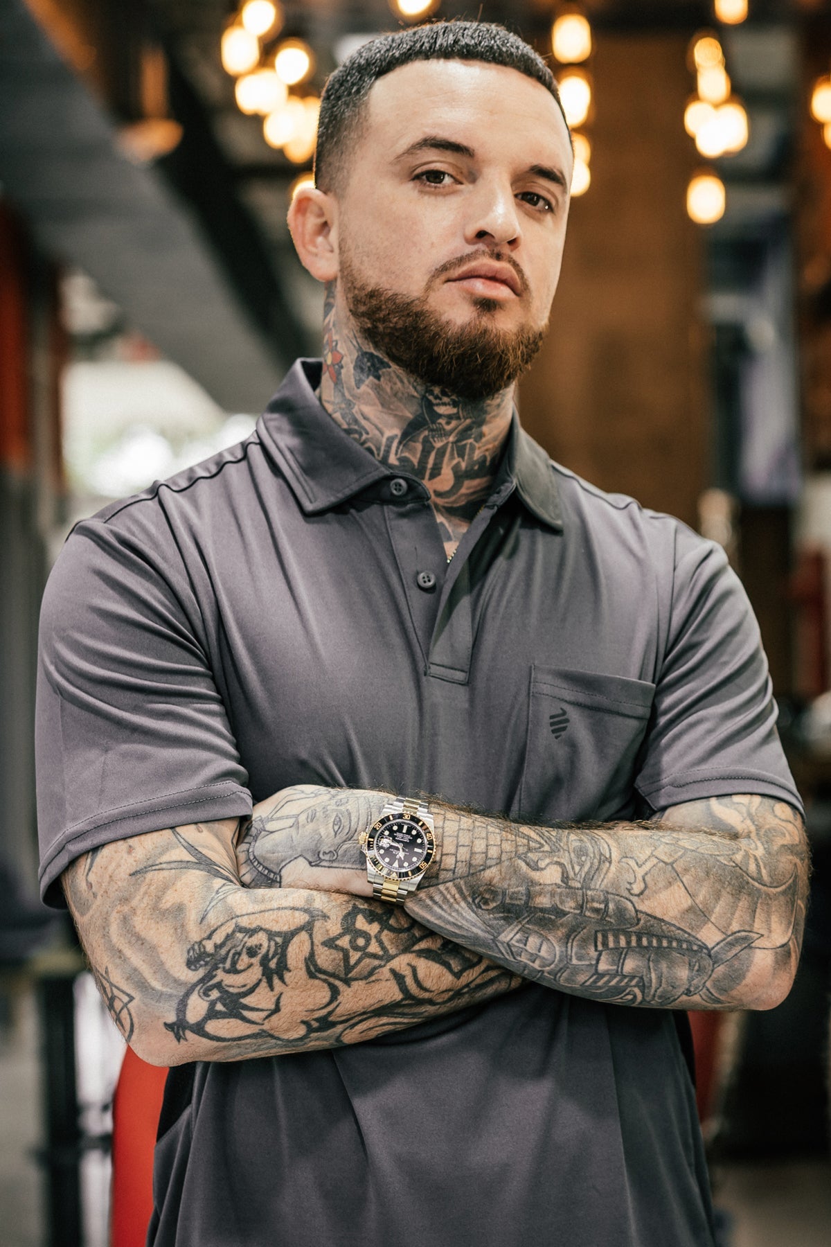 Barber Strong The Barber Polo in gray worn by a barber