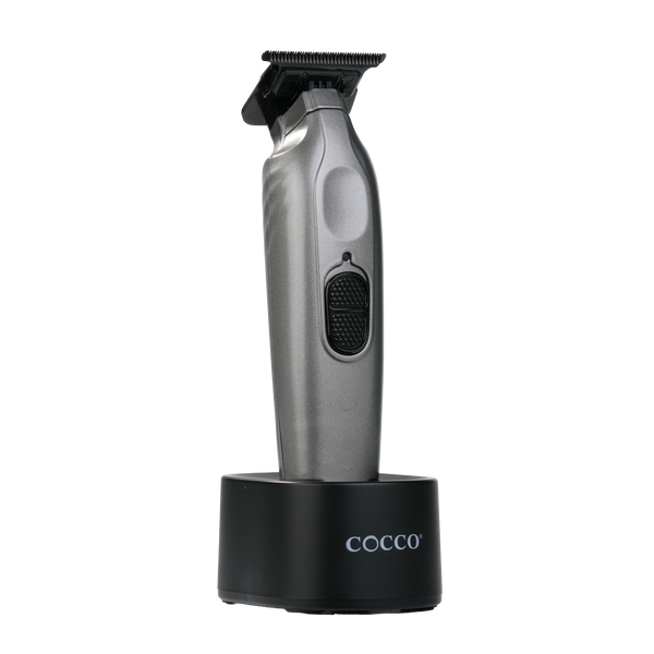 Cocco Veloce Pro matte gray trimmer seated in charging base
