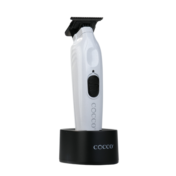 Cocco Veloce Pro pearl white trimmer seated in charging base