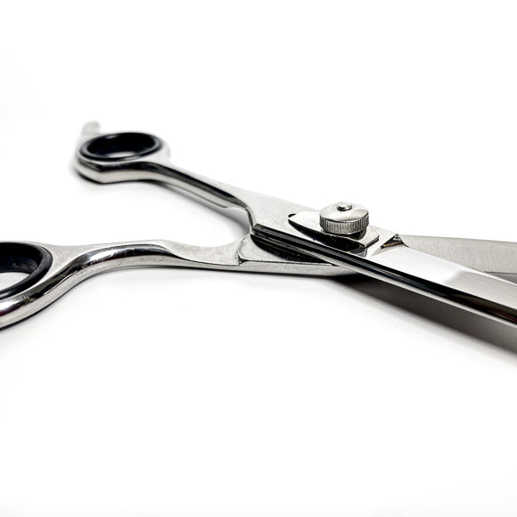 Diamond Cuts curved hair shears mirror-polished blade view
