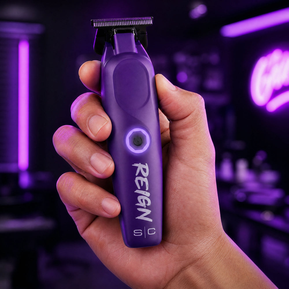 StyleCraft Reign SC422P purple trimmer shown in hand