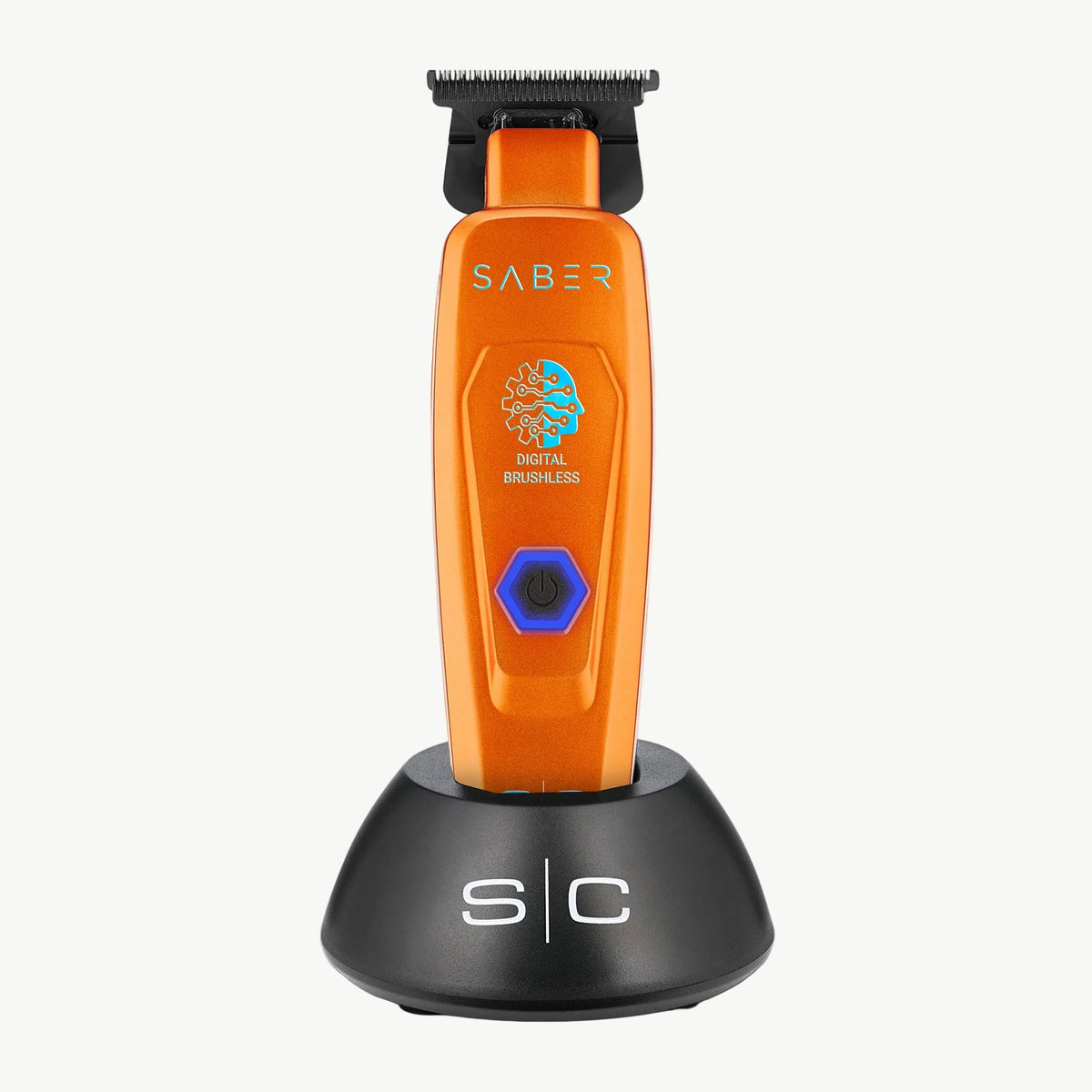 StyleCraft Saber SC421O Orange professional trimmer on charging stand